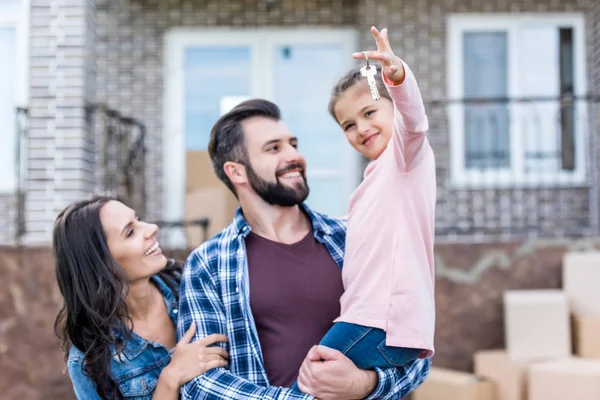 stock-photo-family-moving-into-new-house